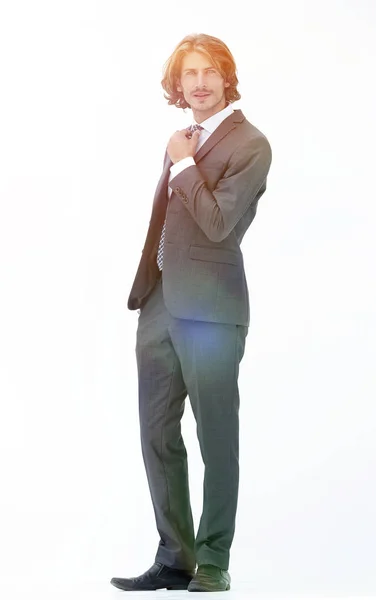 Geschäftsmann richtet seine Krawatte isoliert auf weißem Hintergrund — Stockfoto
