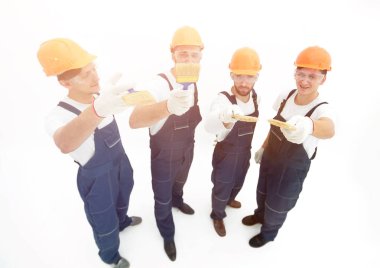 En baştan görüntüleyin. inşaatçılar .isolated beyaz bir grup