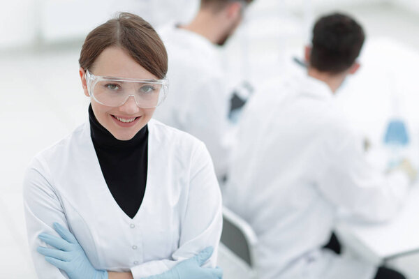 portrait of scientist in laboratory background.