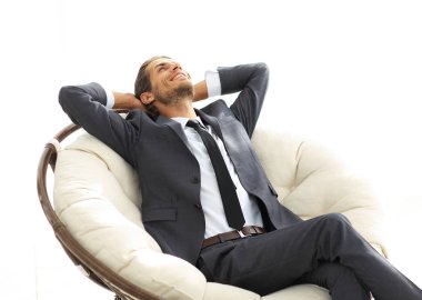 genç işadamı büyük rahat koltukta, meditasyon