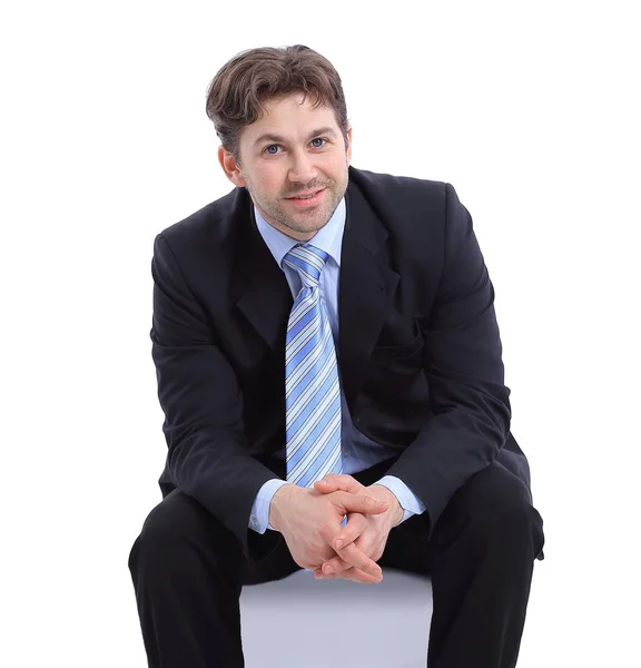 Säker affärsman sitter på stol — Stockfoto