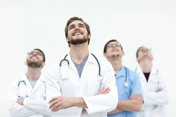 Talentoso médico olhando para o topo, no espaço de cópia — Fotografia de Stock