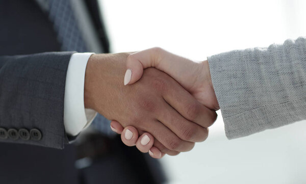 Business people shaking hands isolated on white background