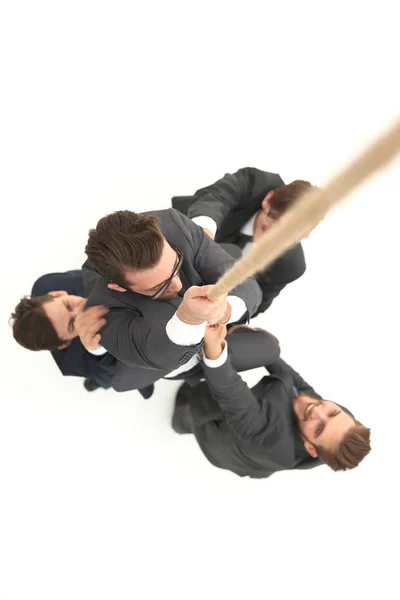 Top view .business equipo ayuda al jefe a subir . — Foto de Stock