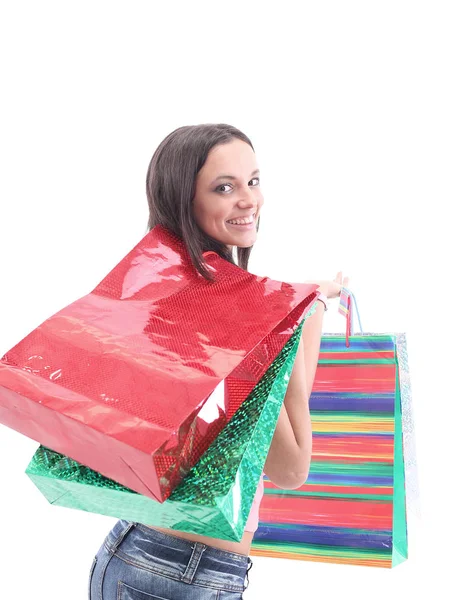 Portrait de jeune femme souriante heureuse avec des sacs à provisions — Photo