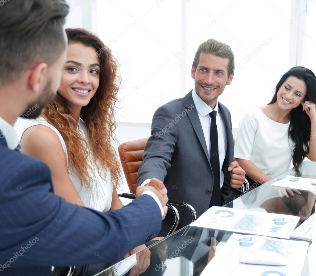businessmen hand shake, during meeting