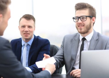 portre. bir iş adamı elinde belge