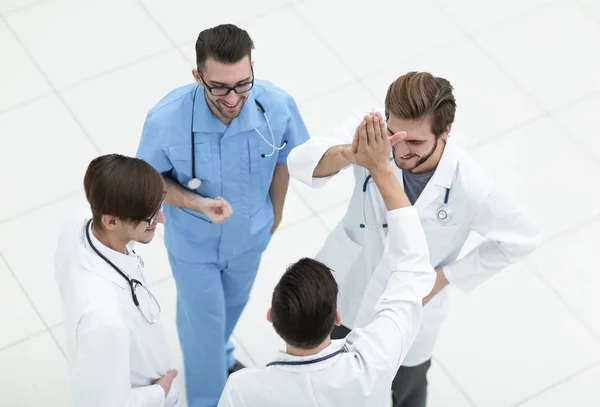 group of doctors discussing work issues