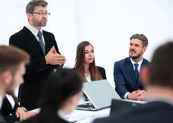 senior Manager makes a report at the briefing.