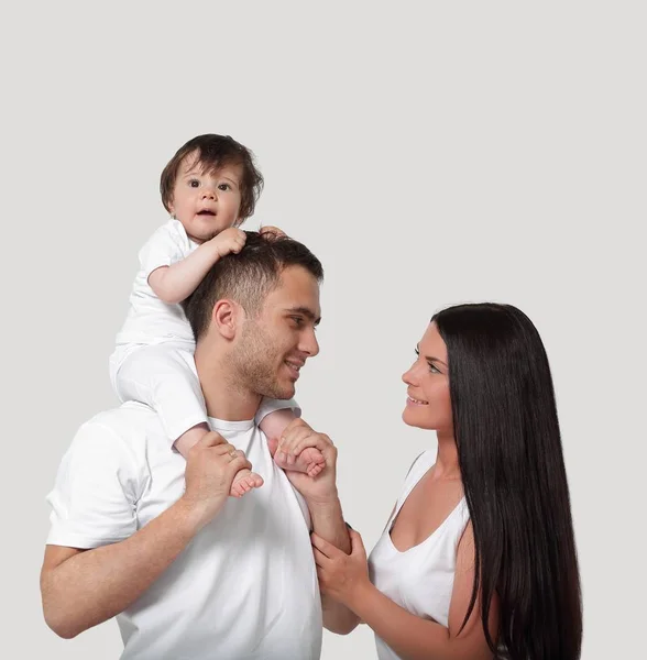 Een gelukkige familie op witte achtergrond — Stockfoto