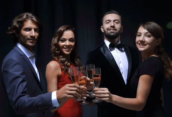 Cheerful people celebrating a sucess with Champagne — Stock Photo, Image