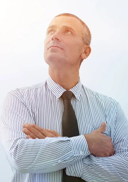 Confident businessman looking into the future — Stock Photo, Image