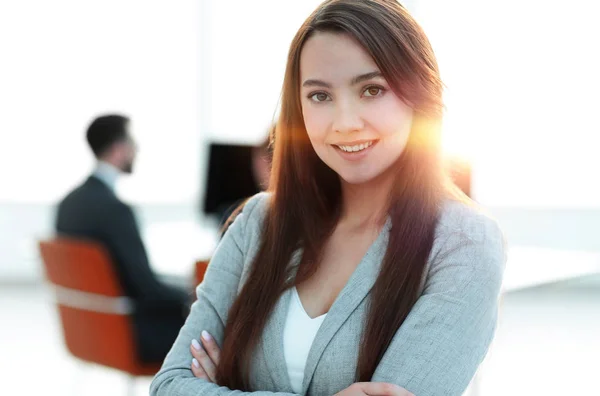 Business woman on blurred background office — Stock Photo, Image