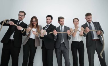 İş adamlarının yumrukları, iplerden kurtulmaya çalışıyor.