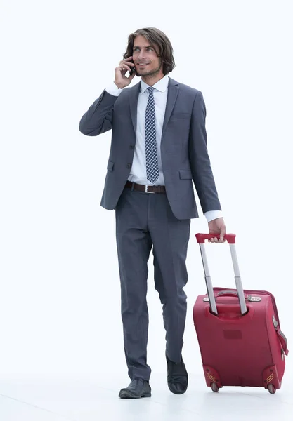 Empresário de sucesso com bagagem falando ao telefone . — Fotografia de Stock