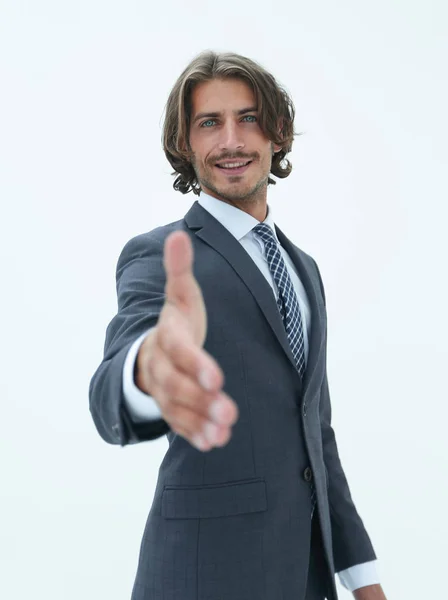 Sorridente uomo d'affari amichevole offre una stretta di mano — Foto Stock