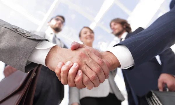 In the foreground.handshake of business partners — Stock Photo, Image