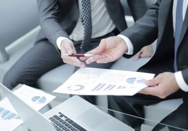 Business team hands at work with financial reports — Stock Photo, Image