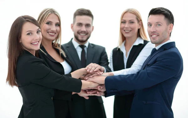 Lächelndes Business-Team mit ineinander verschränkten Händen — Stockfoto
