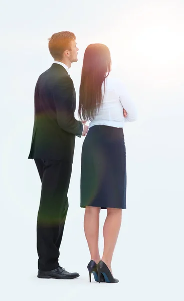 Rear view. businessman and business woman standing next to and looking forward. — Stock Photo, Image