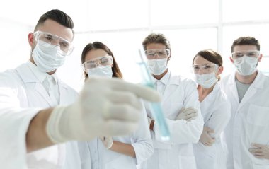 arka plan görüntüsü tıbbi işçilerin laboratuvar sıvı ile çalışma grubudur