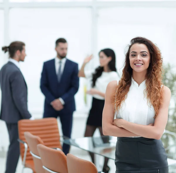 beautiful woman on the background of business people. photo with copy space