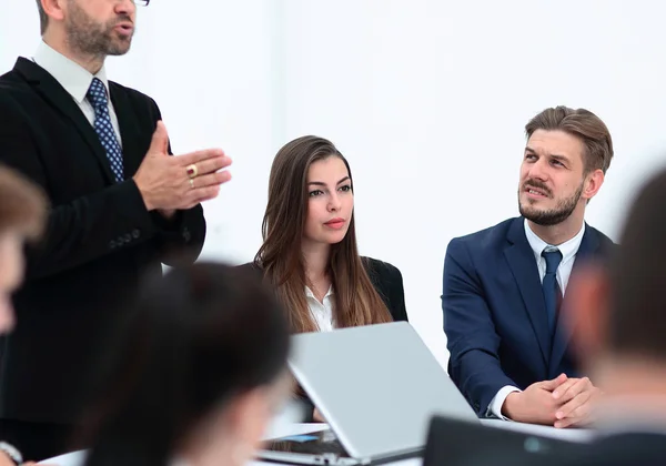 senior Manager makes a report at the briefing.