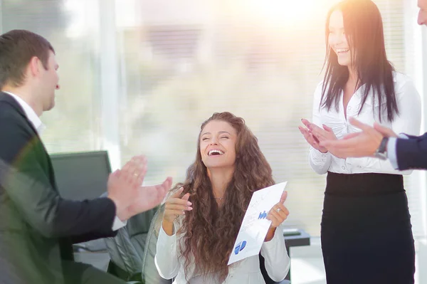 Business team applauding their achievements Royalty Free Stock Photos