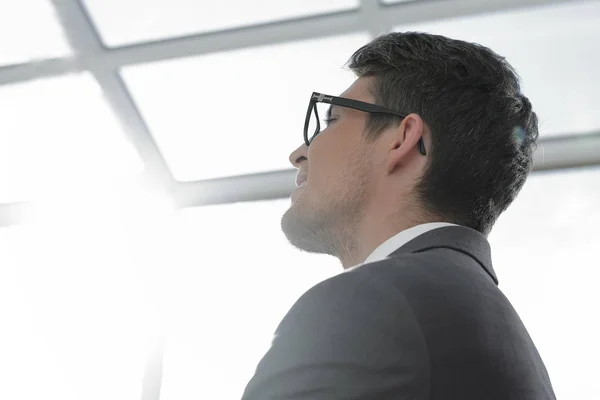 Close up.modern young businessman looking for copy space — Stock Photo, Image