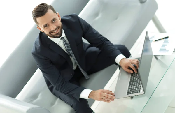 Top view of businessman working on laptop in office — Stock Photo, Image