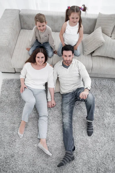 Top view.portrait van een gelukkige familie — Stockfoto