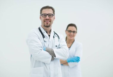 Doktor ve hemşire hafif bir arka plan üzerinde.