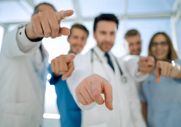 Doctors pointing with the index finger at the viewer. — Stock Photo, Image