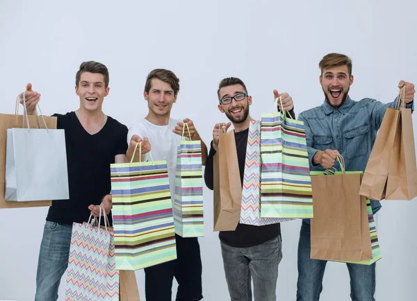 Bolsas de papel en manos de un equipo de amigos —  Fotos de Stock