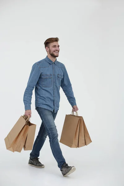 Foto de un hombre guapo con bolsas de compras —  Fotos de Stock