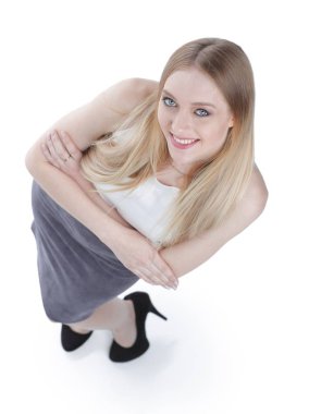 Yukarıdan görüntüleyin. Kameraya bakarak başarılı genç iş kadını.