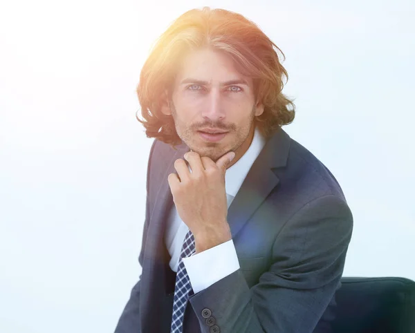 Portrait businessman sitting on chair and thinking — Stock Photo, Image