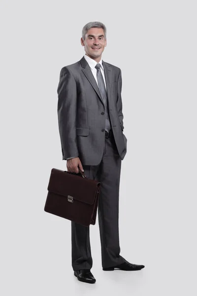 Confident businessman with briefcase. — Stock Photo, Image