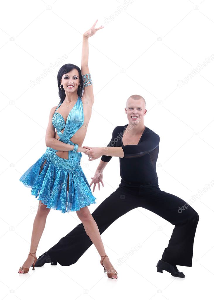 Dancing young couple isolated on a white background.