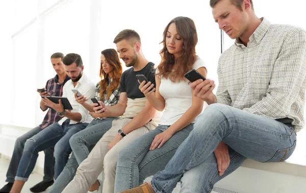 Business team using a mobile device — Stock Photo, Image