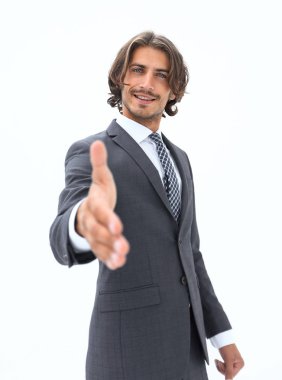 Gülümseyen dost canlısı iş adamı el sıkışmayı teklif ediyor
