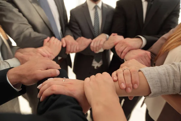 Close up.business team showing their unity — Stock Photo, Image