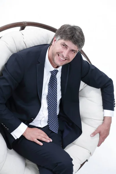 Вид зверху успішного бізнесмена, що сидить у зручному кріслі — стокове фото