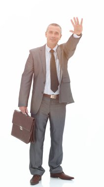 Kendine güvenen işadamı konuksever bir el hareketi yapma