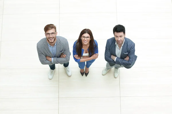 View.three colegas de negocios de pie juntos — Foto de Stock