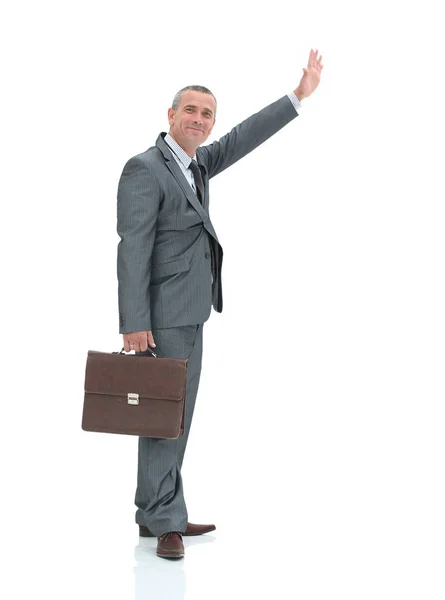 Вид збоку. Усміхнений бізнесмен робить жест зупинки руки — стокове фото