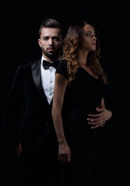 şık erkek ve kadın yan yana studio poz.