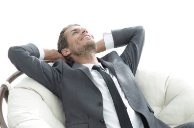 genç işadamı büyük rahat koltukta, meditasyon