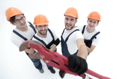 bir gaz anahtarı gösterilen inşaatçılar top.group görüntülemek.