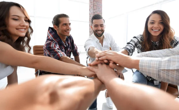 closeup. business team with hands clasped together